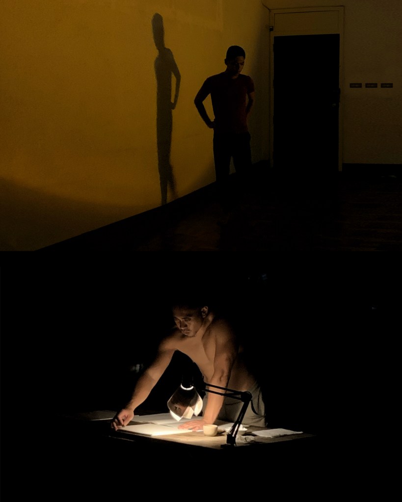 A shadow of a person standing against a wall, with a second image showing an individual focused on work at a table, illuminated by a desk lamp.
